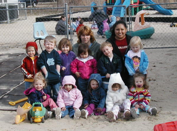 Sophie visited her friends at daycare--she's the third from the left on the top row
